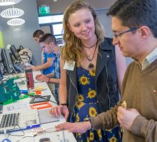 NEXIS students working on a project at Syracuse University